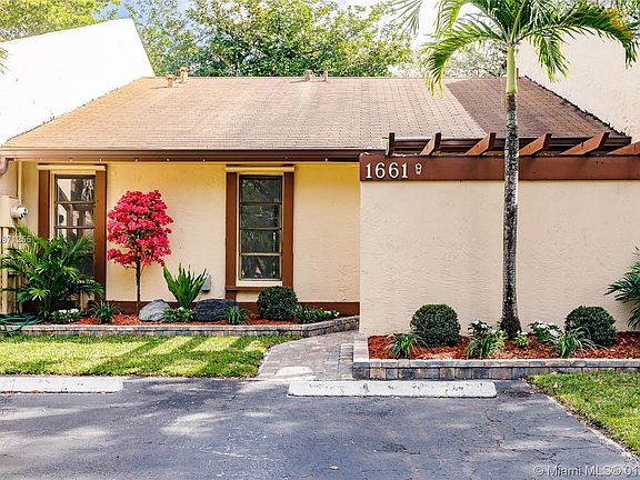 Front Elevation with 2 designated parking spaces