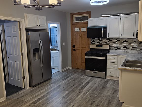 2nd image of 5702 W 64th Pl #1