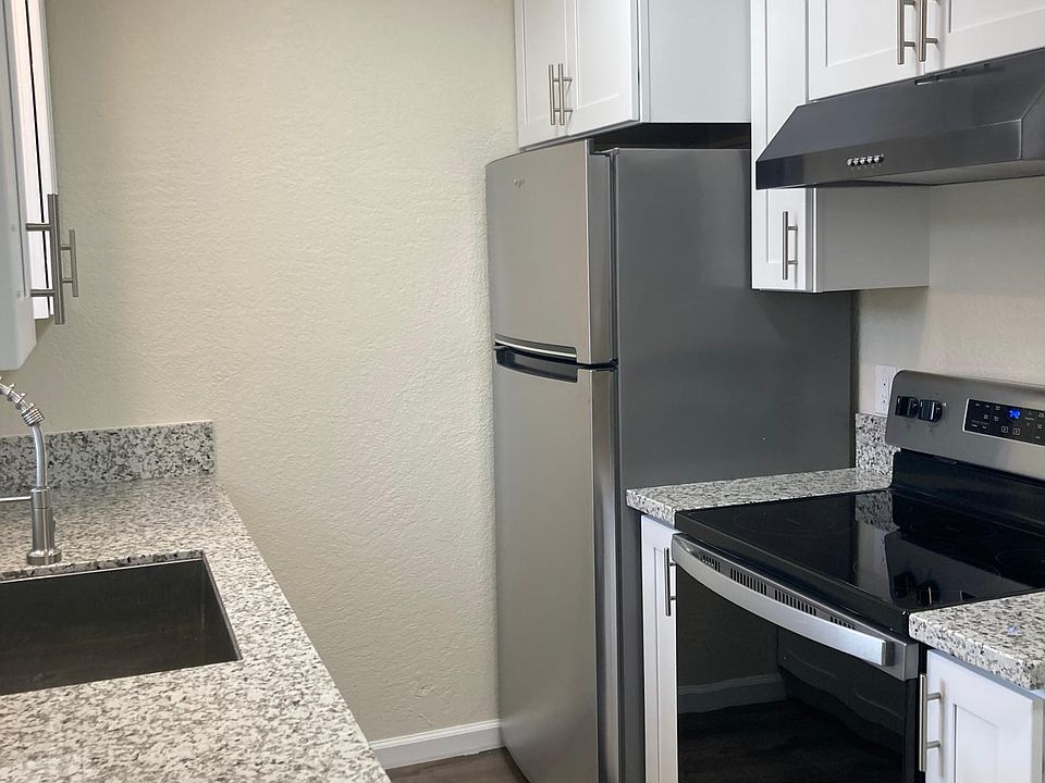 Window over sink in kitchen.