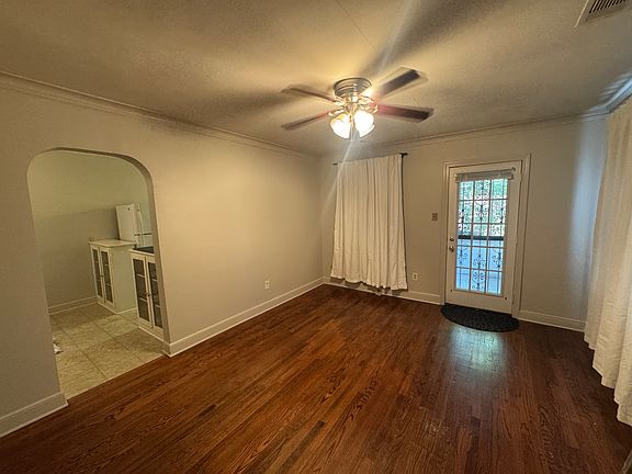 Living room showing doorway to kitchen & side porch