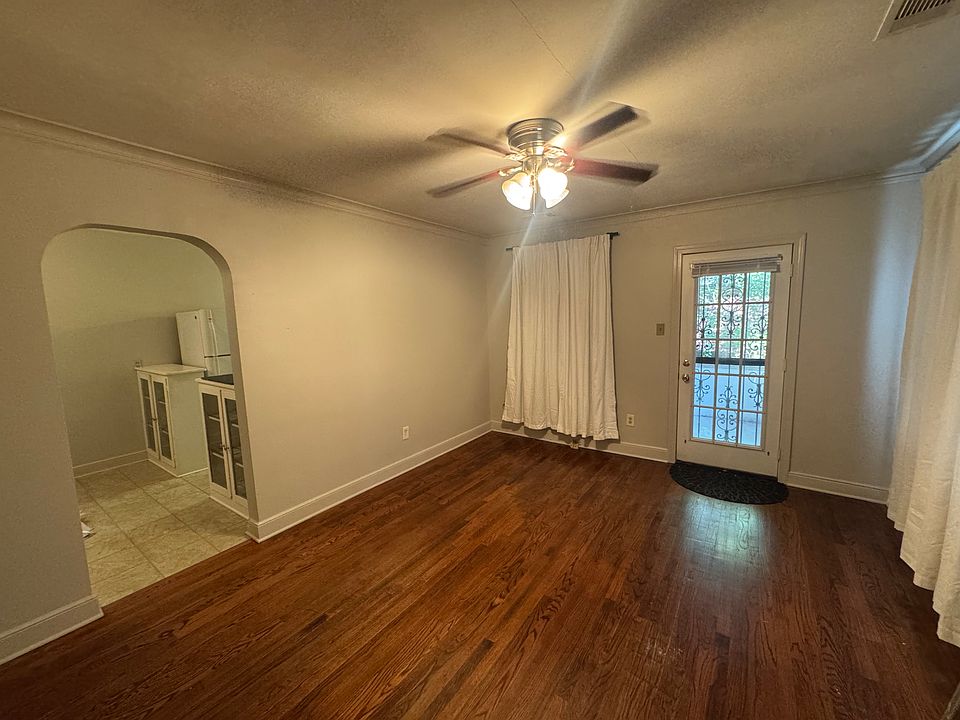 Living room showing doorway to kitchen & side porch