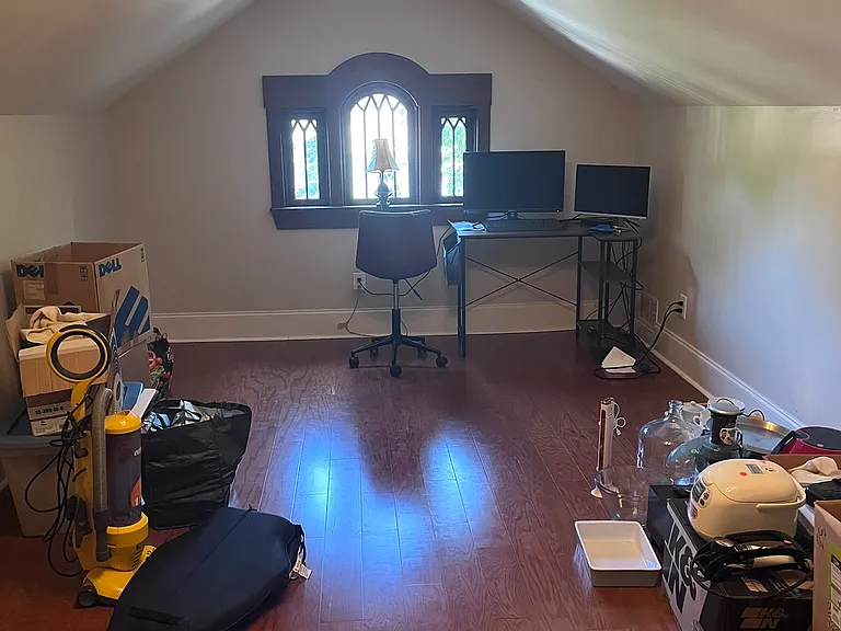 Upstairs bedroom #3 with a large closet. Currently storage