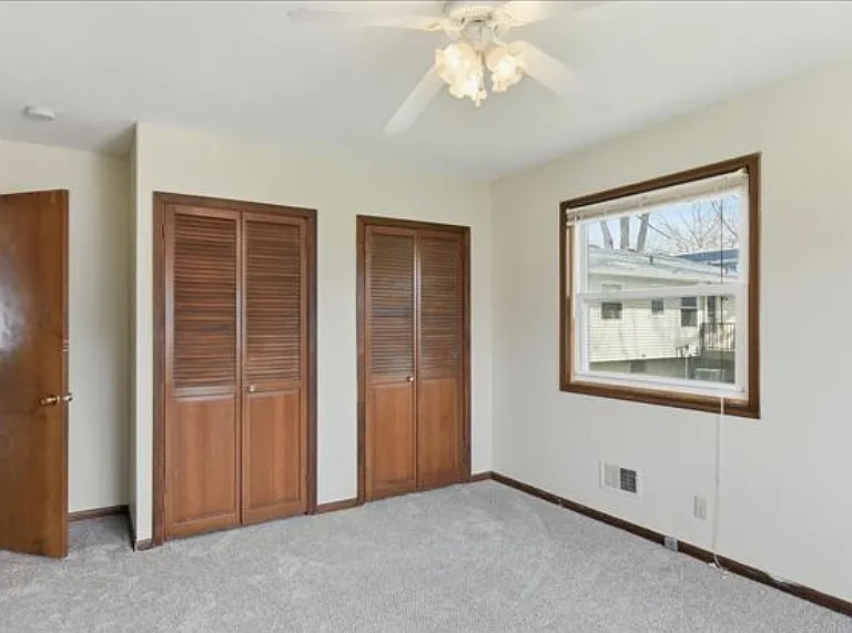 Primary bedroom dual closets
