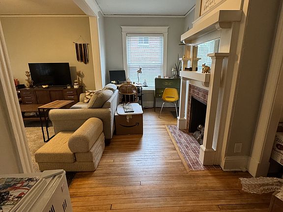 Back of living room, fireplace