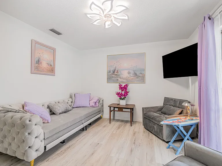 2nd Floor Sitting Room / Bedroom. Sleeper Queen Size Couch with 2 Sleeper Chairs. Very Comfortable. Smart 50" Samsung TV
