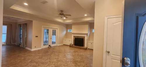 Dining Room, on left & Living Room, on right - 105 Shadow Wood Bnd