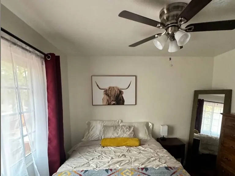 Bedroom with queen bed.