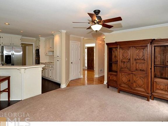 Den view into kitchen (old countertops)