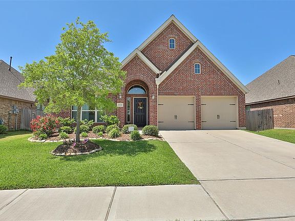 The spacious two car attached garage adds convenience as well as security. Great for late night arrivals and and rainy days.