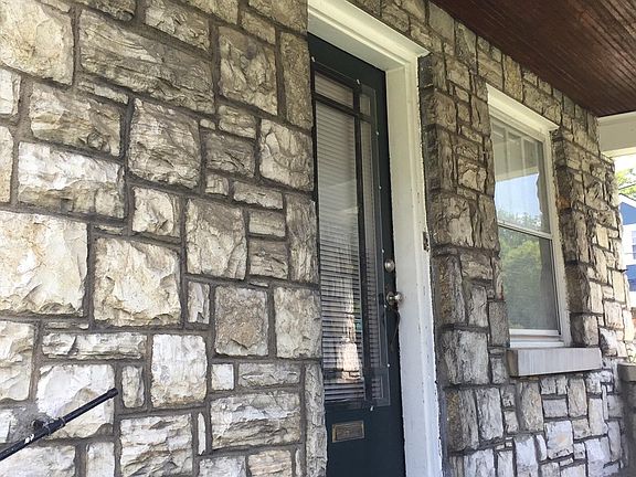 Beautiful front entrance with cozy front porch!