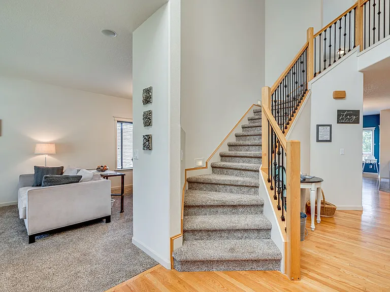 Straight ahead for the kitchen, living room, or office, left for the sitting room or secondary dining area, upstairs for the bedrooms