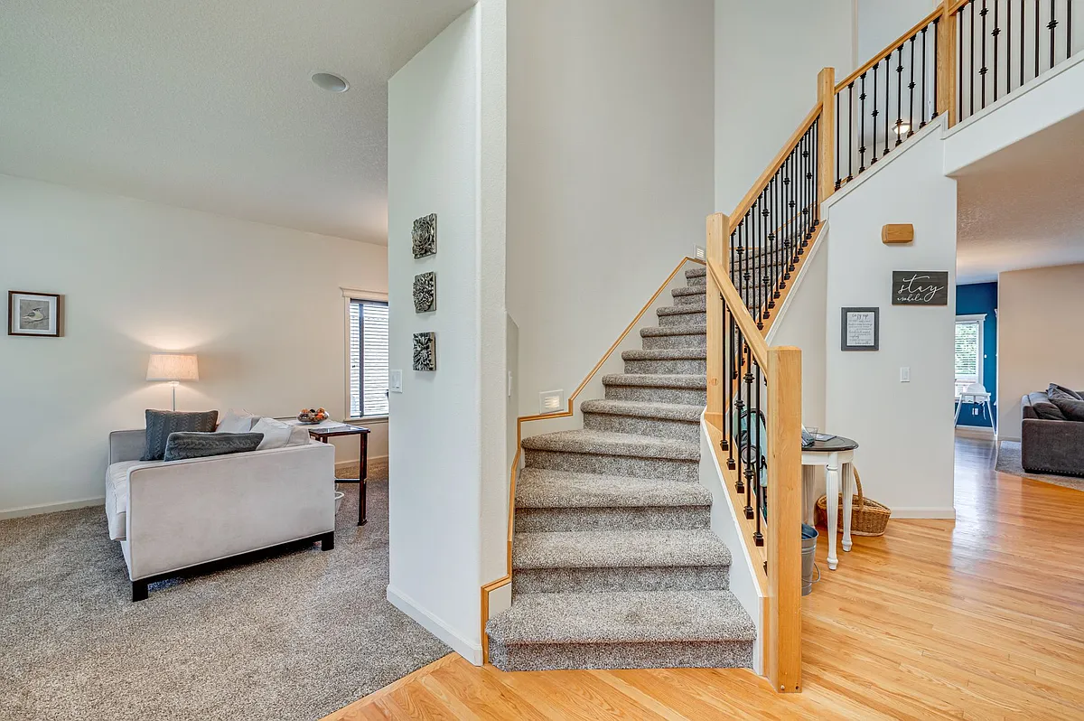 Straight ahead for the kitchen, living room, or office, left for the sitting room or secondary dining area, upstairs for the bedrooms - 37th St