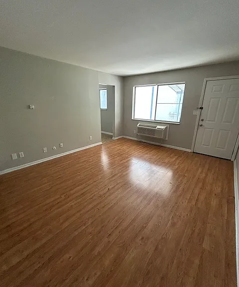 Living room with Ac/heater wall unit