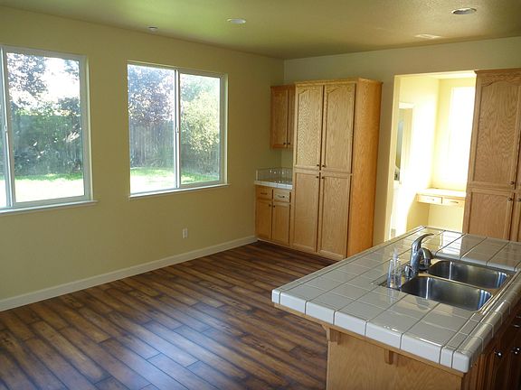 Lots of natural light throughout including the kitchen and dining area.