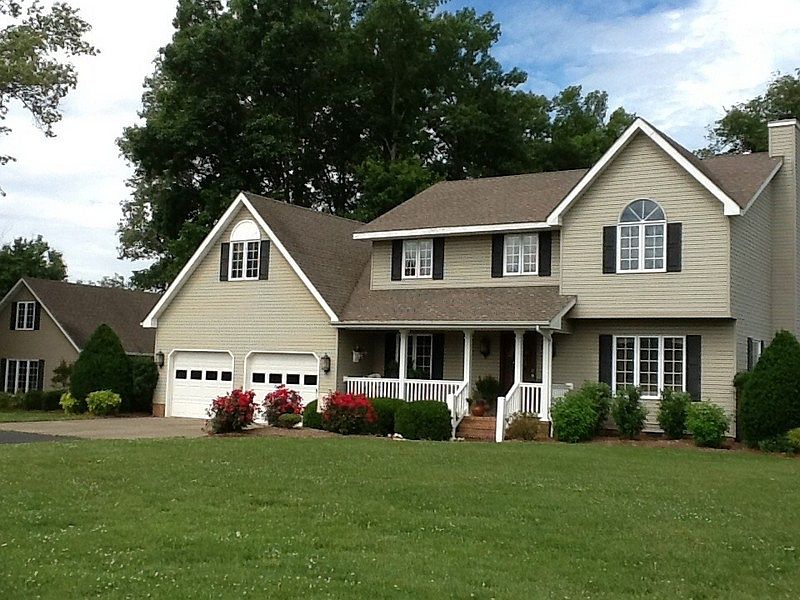 Front yard faces East
						:
						Detached garage to south and above ground pool to north
