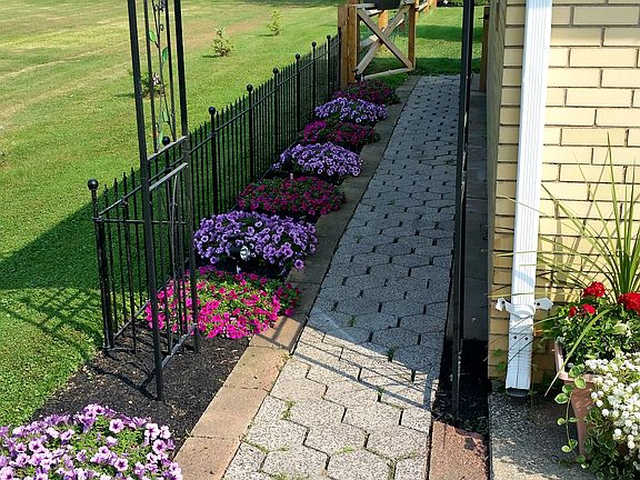 Walkway next to garage