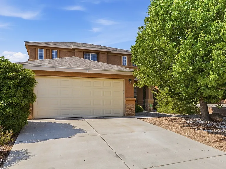 7704 Snowy Egret Ct NW — Photo 1