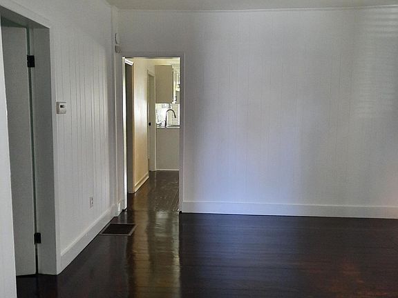 Living room looking in room entryway