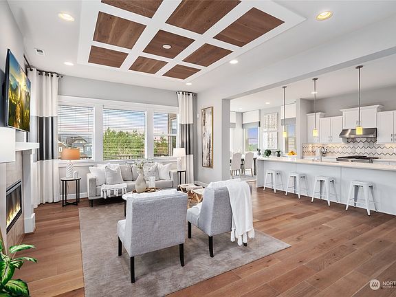 Entertaining will be a delight in this exquisite great room infused with light. >
