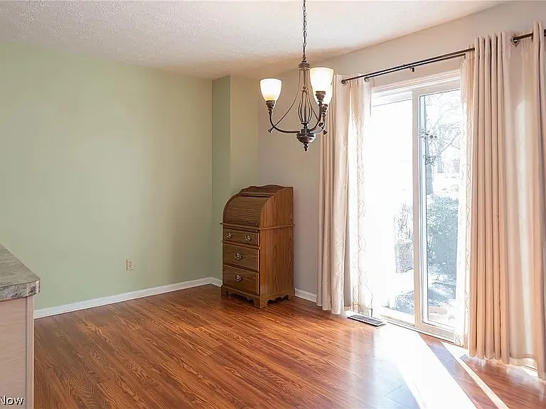 Dining room and slider to patio. New slider 2024.