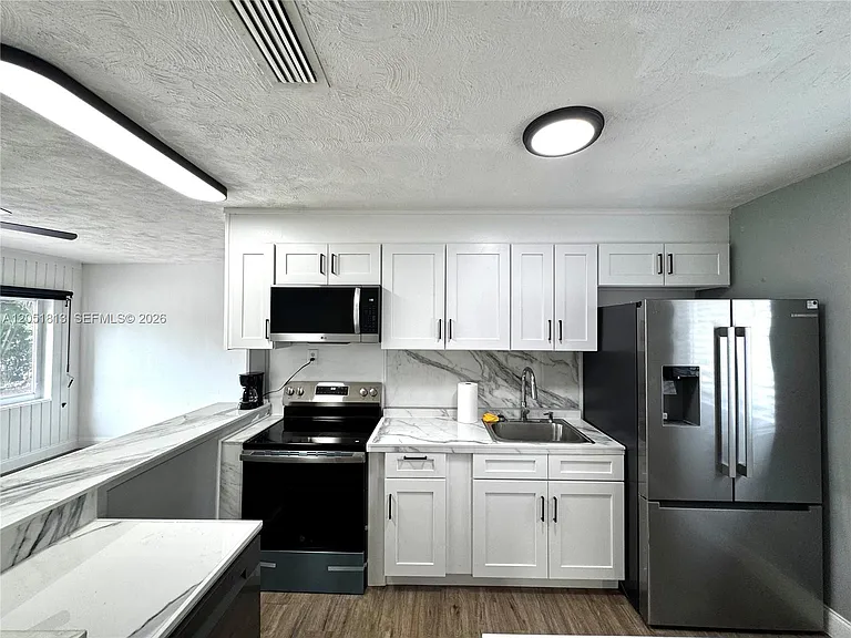 540 NE 61st St — Photo 3