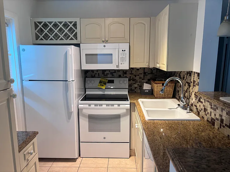 2213 NE 1st Ct #103 — Photo 1