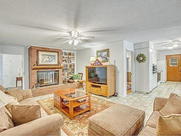 Lots of space throughout. Family Room has wood burning fireplace.