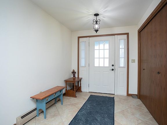 SPACIOUS TILED FOYER!
