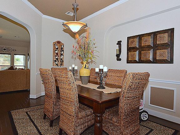 THE FORMAL DINING IS EASILY ACCESSIBLE FROM THE KITCHEN VIA THE BUTLERS PANTRY AND ALSO THE LIVING R