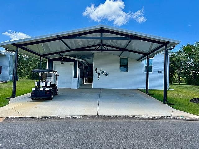 Front of house, carport