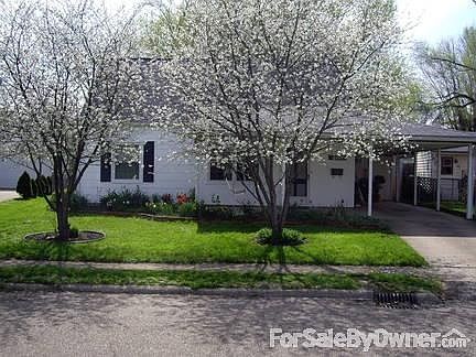 408 Morningside Drive
						:
						Cherry trees, tulips, and daffodils in bloom.
