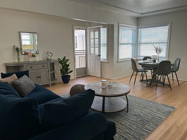 Main living area with comfortable Pottery Barn couch. Hutch has games and books inside.