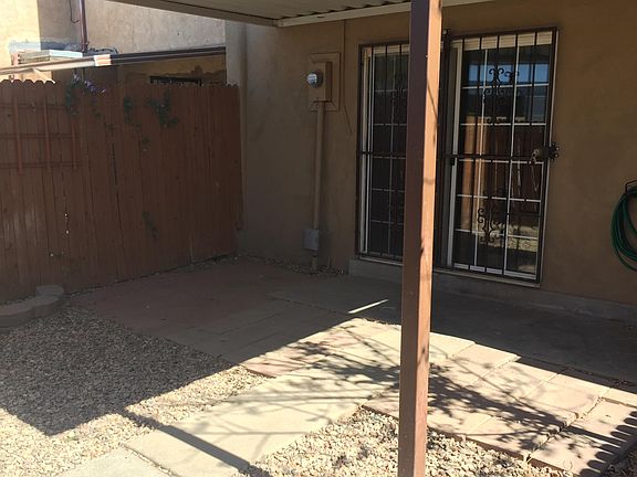 Covered, fenced-in backyard
