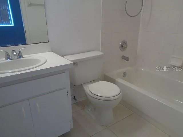 Bathroom has granite countertops with undermount sink which has been updated since photos