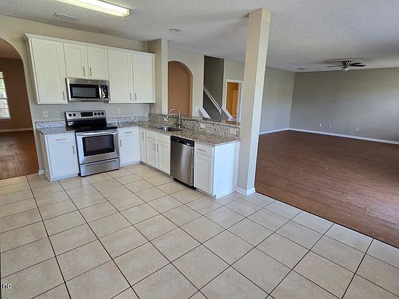 4th image of 1656 HAWKINS COVE Drive E