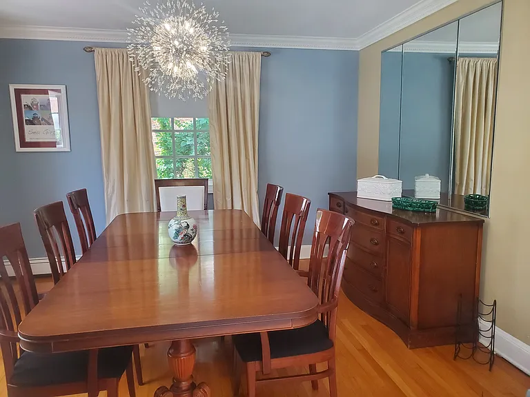 Dining room with large bay window facing the backyard.
