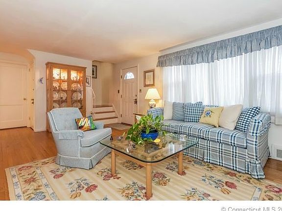 Living room, front door and...