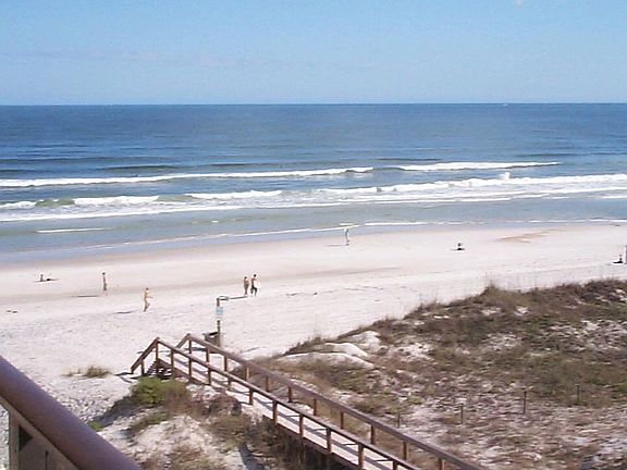 Beach view from top floor balcony.