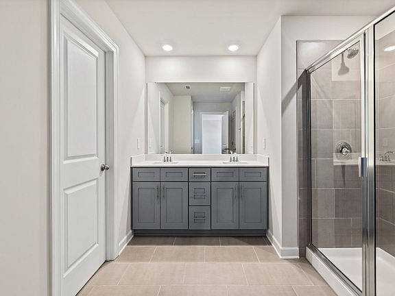 The primary bathroom connects to your bedroom for privacy and convenience.