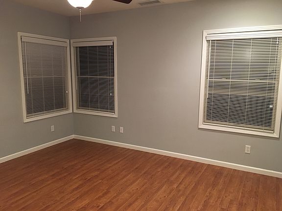 Master bedroom has a walk in closet and a bathroom.