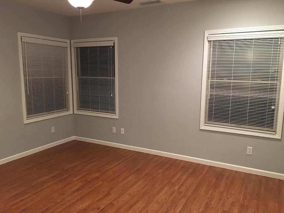 Master bedroom has a walk in closet and a bathroom.