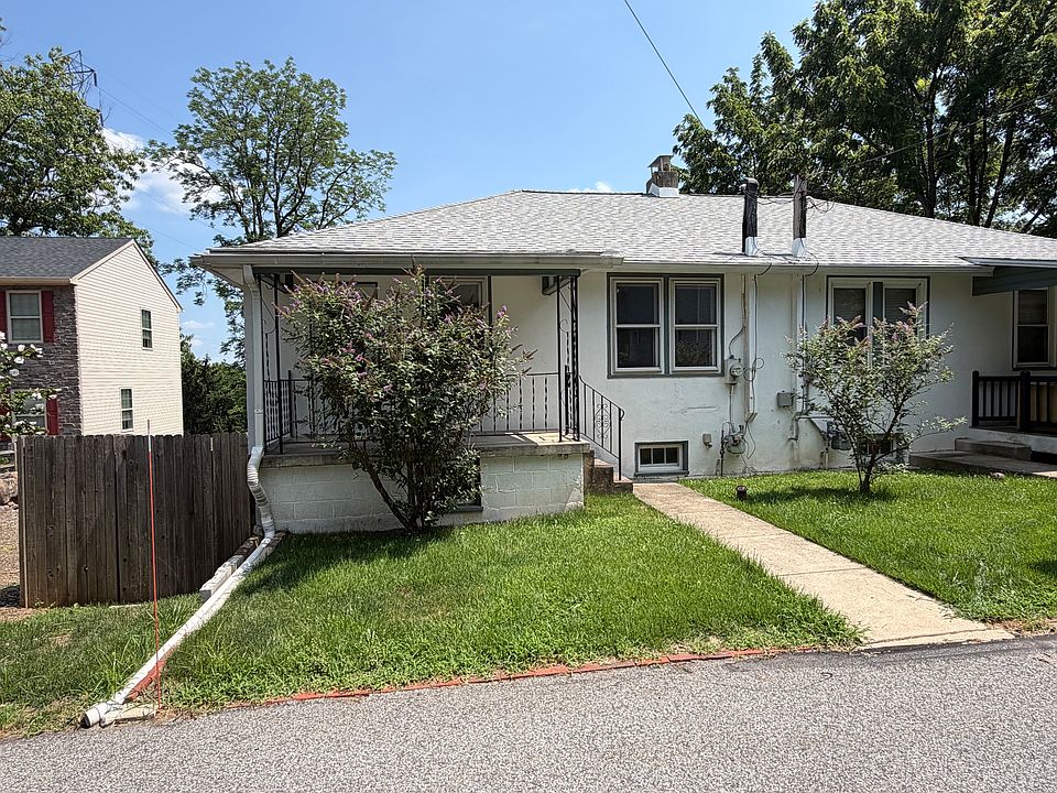 Exterior Front / Parking Around back