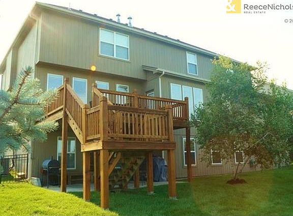 Freshly stained entertainment deck, patio from the walkout basement, professionally landscaped lush back yard (with sprinkler system).  Metal fence for safety of family and pets.