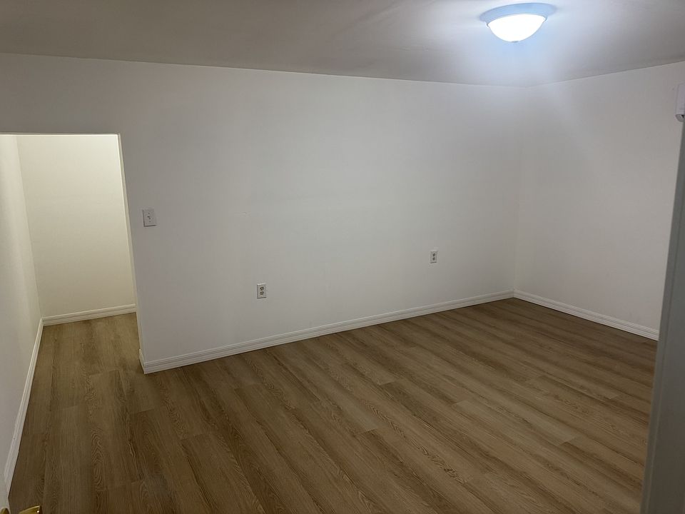 Massive Bedroom with its own Mini Split AC Unit and an ensuite walk-in closet.