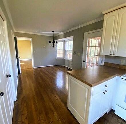 Breakfast nook and door to the back deck