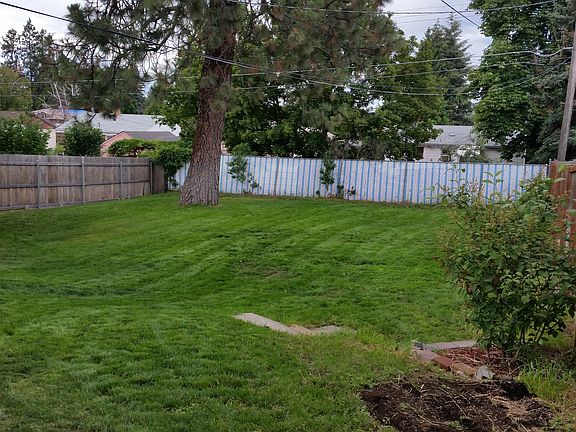 Large fenced back yard.