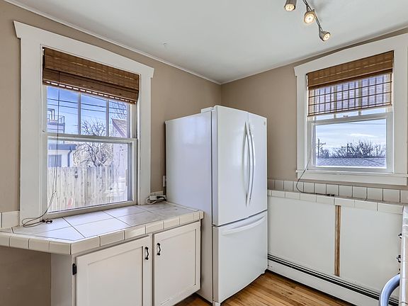 Kitchen with hideaway microwave