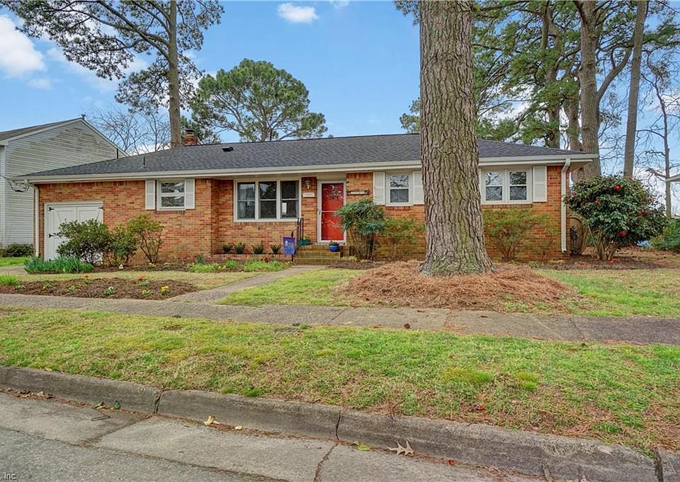 Classic brick ranch in impeccable condition nicely situated on waterfront lot