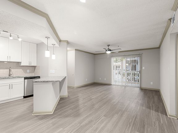 Bright and open living room with contemporary style at Buckhead & Vine Apartments