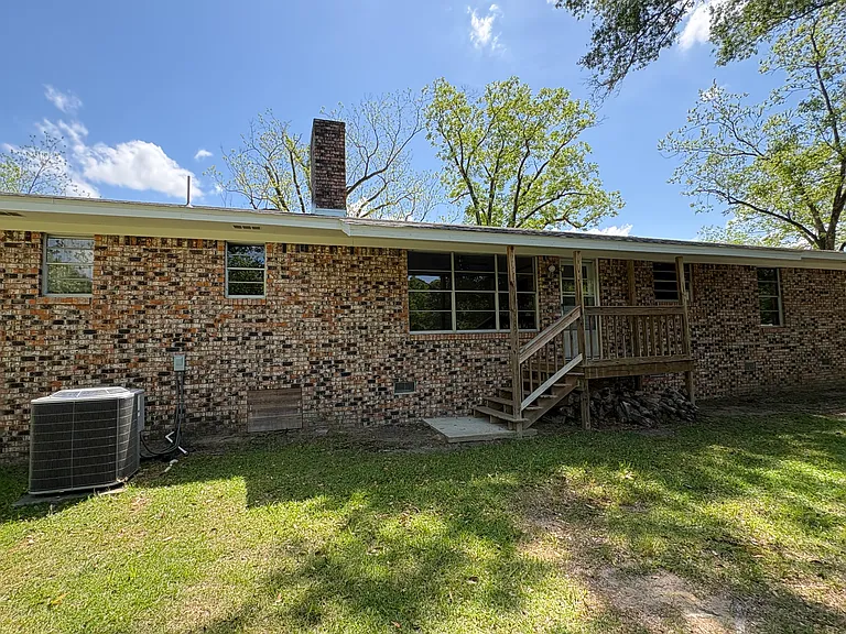 Back of house. New HVAC and porch/steps.